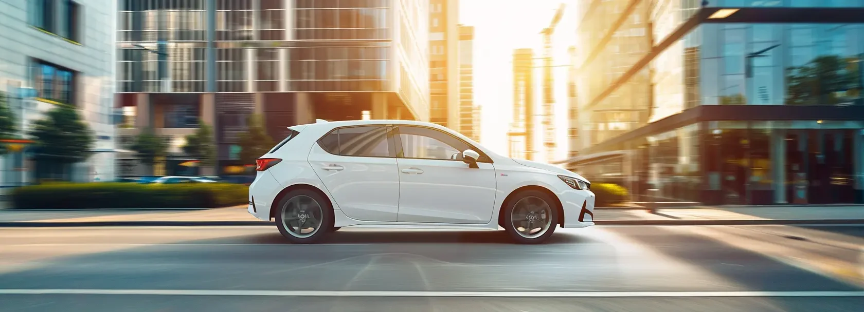 A sleek white compact hatchback